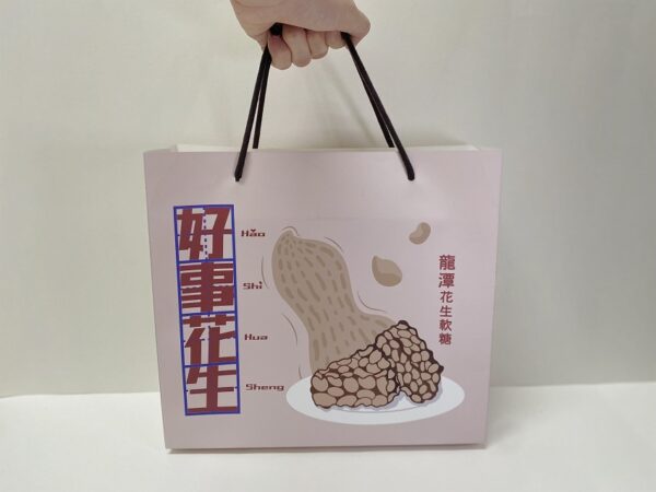 Close-up of branding details on a paper bag showcasing Taiwan Peanut Food Packaging Design.