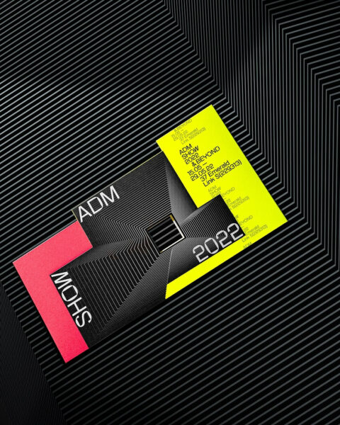 Tickets for the ADM Show designed by Roy Wang, featuring a sleek and innovative design.