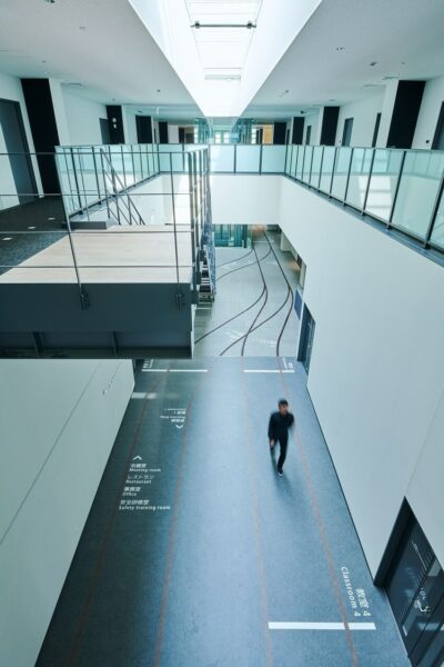 Interior view showcasing functional typography designed by Takuya Wakizaki within Totetsu Training Institute