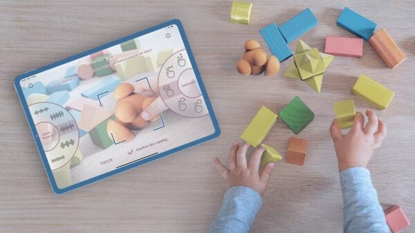 UI & UX Design - showing the gamified music education app in action - when a child is playing with toys/blocks.