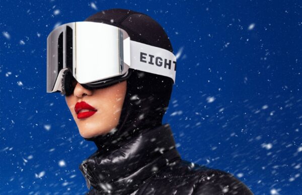 Studio setup with a white winter backdrop and the Eight Sleep Pod at center stage.