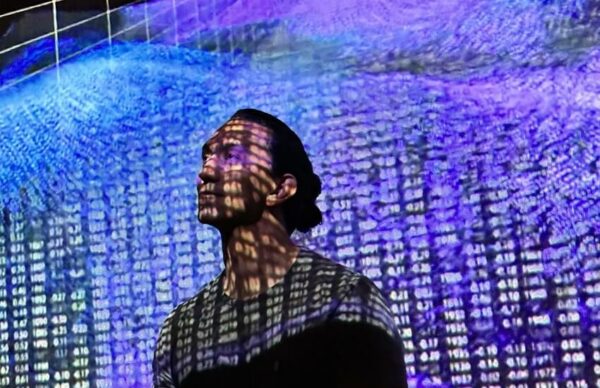 Interior view of “Datum Line,” emphasizing the synchronized interplay of light beams, ambient sound, and data-driven visuals.