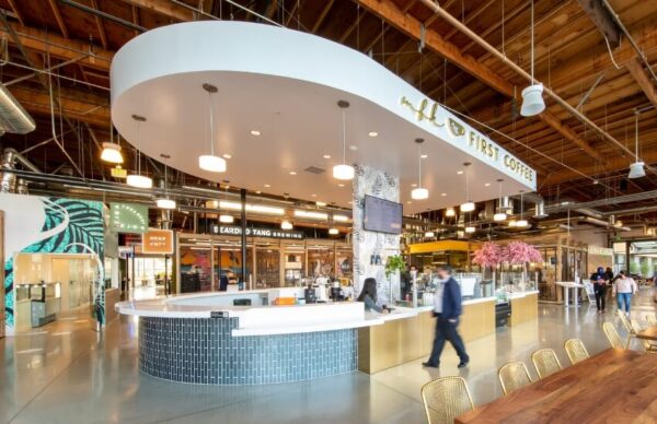 Interior of Rodeo 39 bar with neon signage, playful typography, and murals