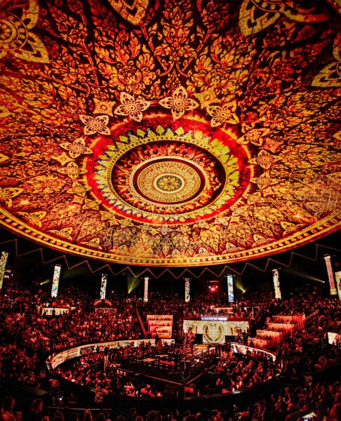 Audience experiencing immersive Muay Thai storytelling at Rajadamnern