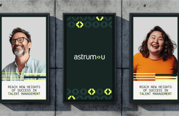 AstrumU brand identity displayed on exterior billboards and frames